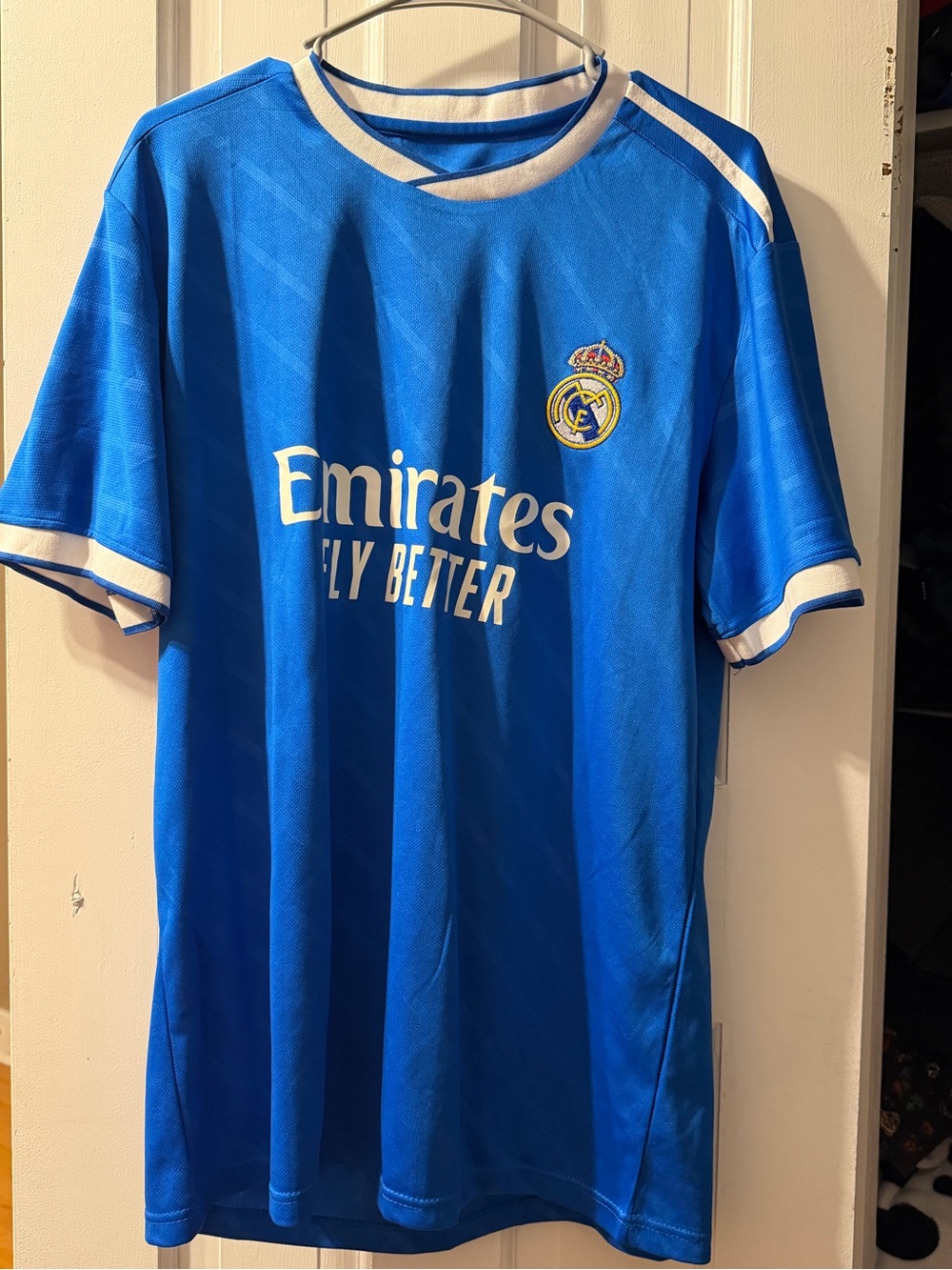 Real Madrid Men's Blue Football Jersey with Emirates Sponsor